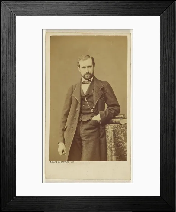 Framed Print : Unidentified well-dressed bearded man standing, elbow on books on a table, 1865-1870. Creator: Bayard & Bertall Framed Print : Unidentified well-dressed bearded man standing, elbow on books on a table, 1865-1870. Creator: Bayard & Bertall