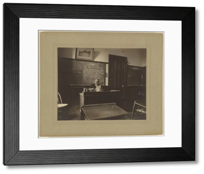 Framed Print : Portrait of a male mathematics teacher with moustache seated at his classroom desk, about 1900. Creator: Unknown Framed Print : Portrait of a male mathematics teacher with moustache seated at his classroom desk, about 1900. Creator: Unknown