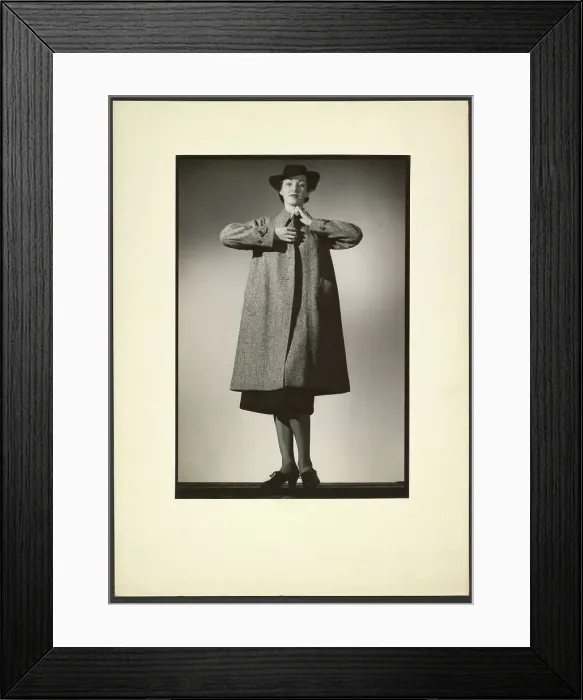 Framed Print : Woman modeling a coat, early 1940s. Creator: Gunther Krampf Framed Print : Woman modeling a coat, early 1940s. Creator: Gunther Krampf