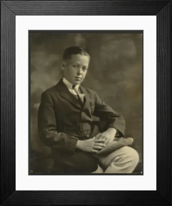 Framed Print : Portrait of a Boy with Cap on Knee, 1907-1943. Creator: Louis Fleckenstein Framed Print : Portrait of a Boy with Cap on Knee, 1907-1943. Creator: Louis Fleckenstein
