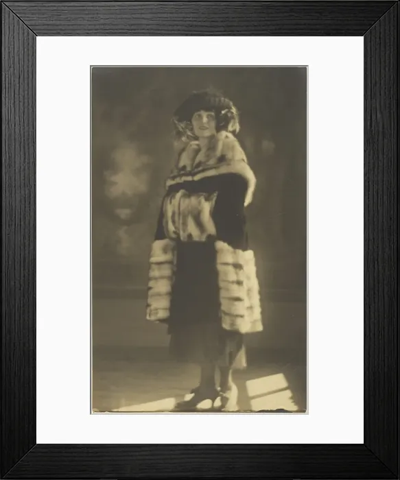 Framed Print : Portrait of a Woman in Fur Coat with Muff, 1907-1943. Creator: Louis Fleckenstein Framed Print : Portrait of a Woman in Fur Coat with Muff, 1907-1943. Creator: Louis Fleckenstein