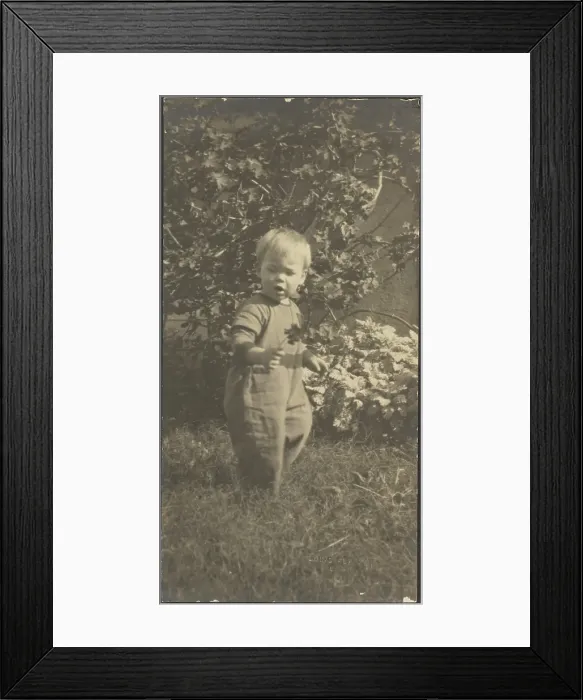 Framed Print : Portrait of a Child in Garden, 1907-1924. Creator: Louis Fleckenstein Framed Print : Portrait of a Child in Garden, 1907-1924. Creator: Louis Fleckenstein