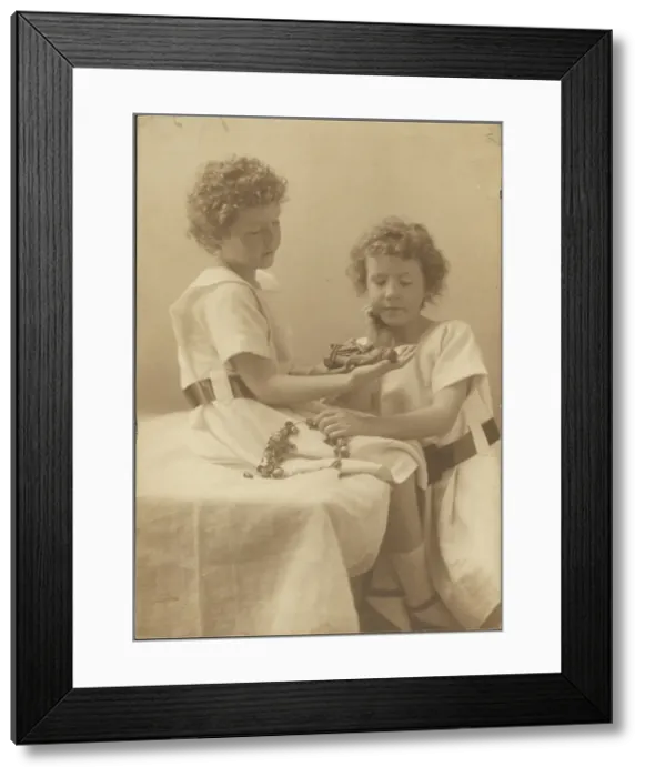 Framed Print : Portrait of Two Sisters Holding Statue and Wreath, 1907-1943. Creator: Louis Fleckenstein Framed Print : Portrait of Two Sisters Holding Statue and Wreath, 1907-1943. Creator: Louis Fleckenstein