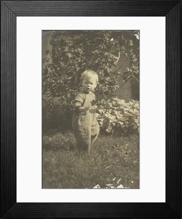 Framed Print : Portrait of a Child in Garden, 1907-1924. Creator: Louis Fleckenstein Framed Print : Portrait of a Child in Garden, 1907-1924. Creator: Louis Fleckenstein