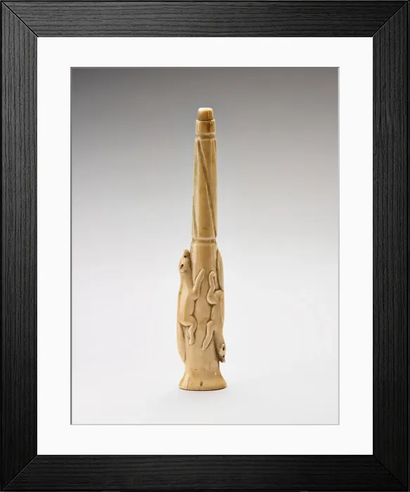 Framed Print : Carved harpoon foreshaft with two running foxes carved in relief, 1880-1920. Creator: Unknown Framed Print : Carved harpoon foreshaft with two running foxes carved in relief, 1880-1920. Creator: Unknown