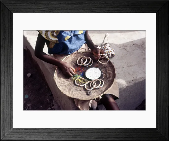 Framed Print : Girl selling hand-made bracelets, Mali, 1990. Creator: Amanda Waite Framed Print : Girl selling hand-made bracelets, Mali, 1990. Creator: Amanda Waite