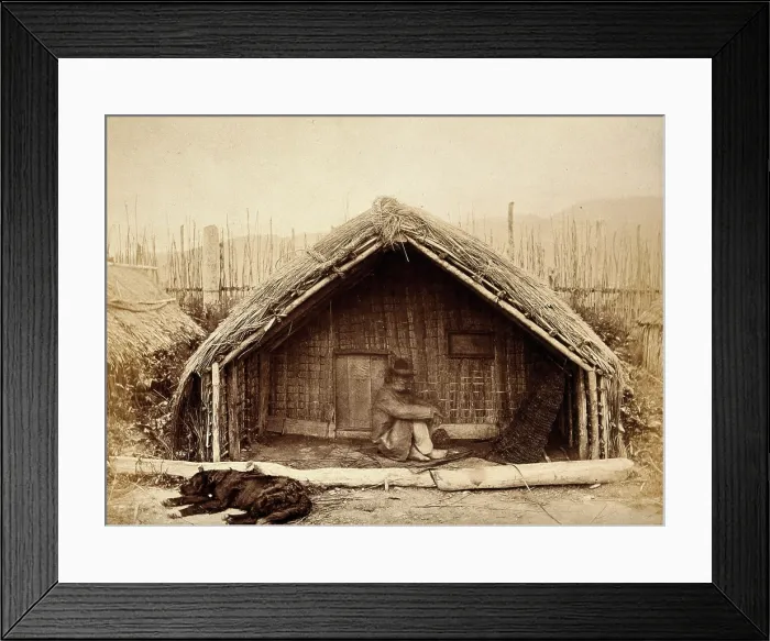 Framed Print : New Zealand: a Maori man sitting in front of a traditional house, between 1800 and 1899. Creator: Unknown Framed Print : New Zealand: a Maori man sitting in front of a traditional house, between 1800 and 1899. Creator: Unknown
