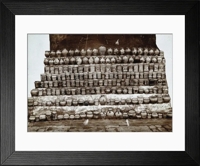 Framed Print : Rows of decorated pharmacy jars and other objects, c19th century. Creator: Unknown