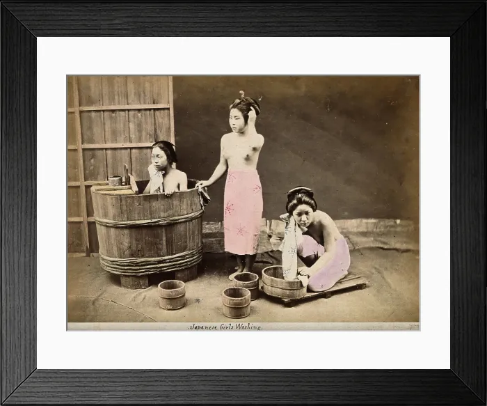 Framed Print : Three Japanese women washing: One in a wooden tub, one standing and one crouching... c1890s. Creator: Unknown Framed Print : Three Japanese women washing: One in a wooden tub, one standing and one crouching... c1890s. Creator: Unknown