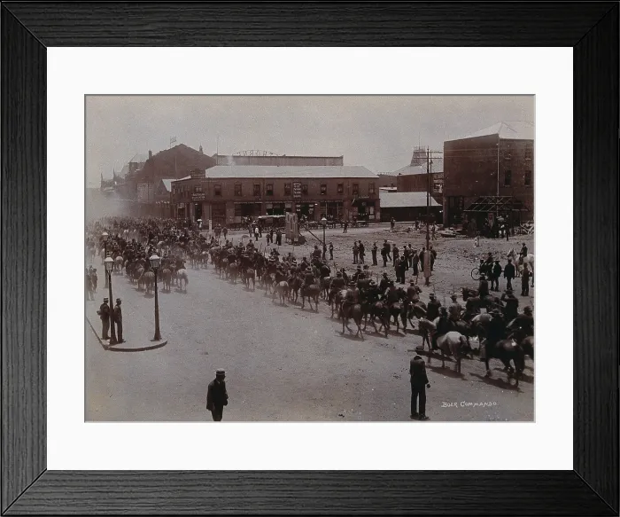 Framed Print : South Africa: Boer soldiers riding through a street in a South African town, 1896. Creator: Barnett Framed Print : South Africa: Boer soldiers riding through a street in a South African town, 1896. Creator: Barnett