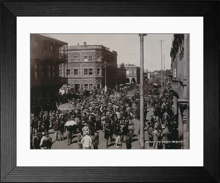 Framed Print : South Africa: a crowd of people gathered for trading in a chained off area outside the... 1896. Creator: Barnett Framed Print : South Africa: a crowd of people gathered for trading in a chained off area outside the... 1896. Creator: Barnett