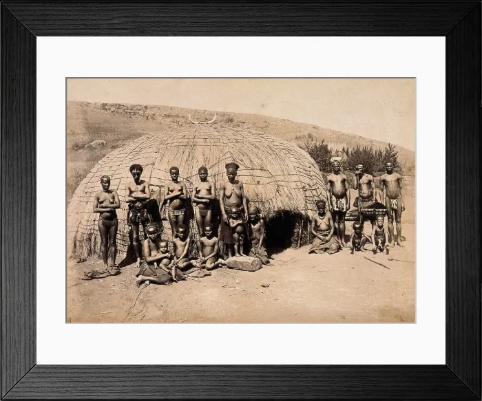 Framed Print : South Africa: Africans in front of a traditional kraal hut, between 1800 and 1899. Creator: Unknown Framed Print : South Africa: Africans in front of a traditional kraal hut, between 1800 and 1899. Creator: Unknown