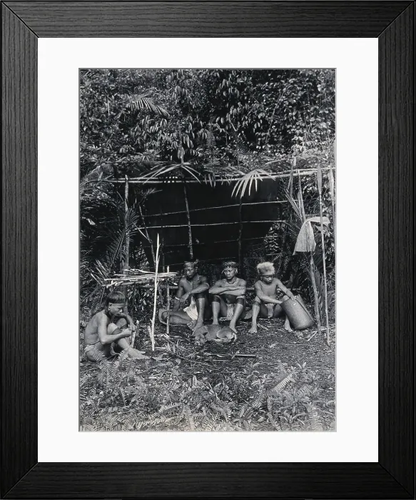 Framed Print : Sarawak: four Kayan hunters in their camp, c1900. Creator: Unknown Framed Print : Sarawak: four Kayan hunters in their camp, c1900. Creator: Unknown