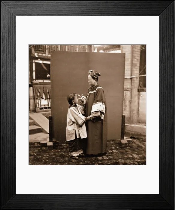 Framed Print : China: a Manchu lady with a child, Beijing, 1869. Creator: John Thomson Framed Print : China: a Manchu lady with a child, Beijing, 1869. Creator: John Thomson