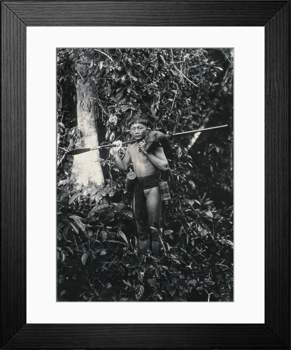 Framed Print : Sarawak: a Kenyah hunter with blowpipe and dead animal, c1900. Creator: Unknown Framed Print : Sarawak: a Kenyah hunter with blowpipe and dead animal, c1900. Creator: Unknown