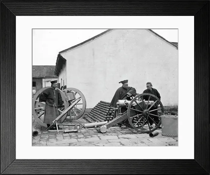Framed Print : Nanking, Kiangsu province, China: three men examining a gun at the arsenal, 1871. Creator: John Thomson Framed Print : Nanking, Kiangsu province, China: three men examining a gun at the arsenal, 1871. Creator: John Thomson