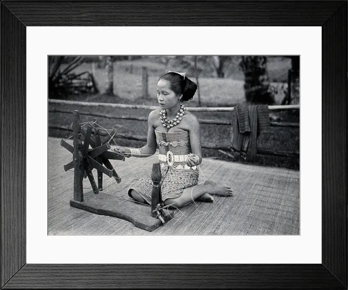 Framed Print : Sarawak: a girl spinning cotton into thread, c1900. Creator: Unknown Framed Print : Sarawak: a girl spinning cotton into thread, c1900. Creator: Unknown