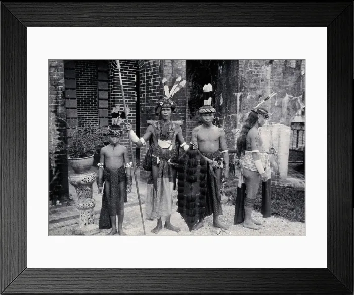 Framed Print : Sarawak: Sea Dayaks with weapons and head-dresses, c1900. Creator: Unknown Framed Print : Sarawak: Sea Dayaks with weapons and head-dresses, c1900. Creator: Unknown