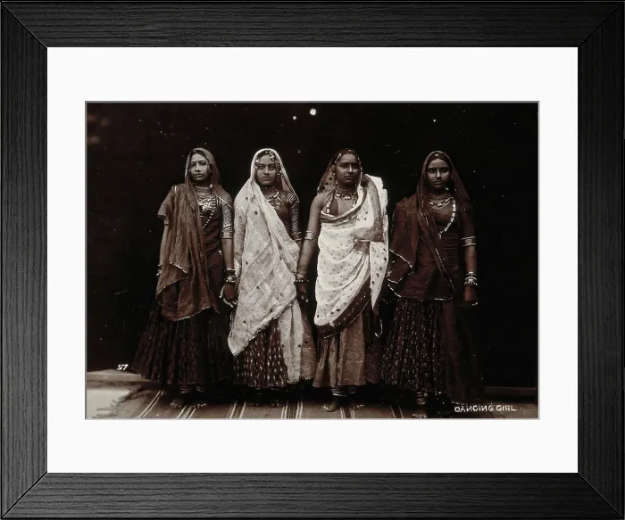 Framed Print : A troupe of nautch dancing girls, standing in a line holding hands, in a studio setting, c1900. Creator: Unknown Framed Print : A troupe of nautch dancing girls, standing in a line holding hands, in a studio setting, c1900. Creator: Unknown