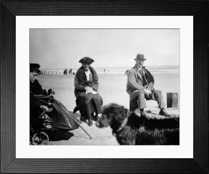 Framed Print : A physically disabled boy sitting in a wheelchair on a beach, c1910 / 1925. Creator: Unknown Framed Print : A physically disabled boy sitting in a wheelchair on a beach, c1910 / 1925. Creator: Unknown