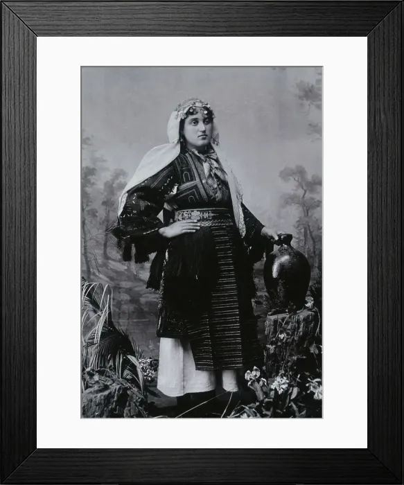 Framed Print : A Bulgarian woman in national dress with a water jug, early 20th century. Creator: Unknown Framed Print : A Bulgarian woman in national dress with a water jug, early 20th century. Creator: Unknown