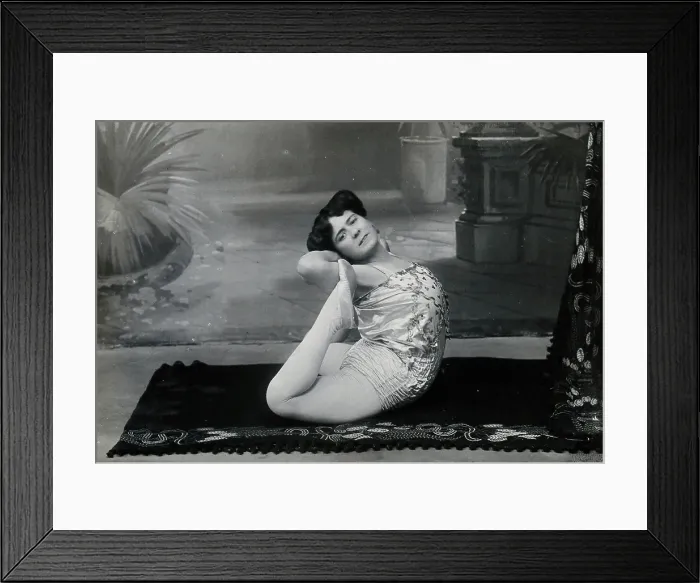 Framed Print : A Bulgarian female acrobat performing contortions in a photographic studio, between 1890 and 1910. Creator: Unknown Framed Print : A Bulgarian female acrobat performing contortions in a photographic studio, between 1890 and 1910. Creator: Unknown