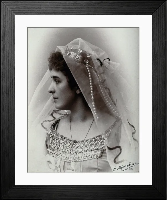 Framed Print : A woman posing in a photographic studio, wearing a bridal? dress and veil, in front of... 1900-1910 Creator: Unknown Framed Print : A woman posing in a photographic studio, wearing a bridal? dress and veil, in front of... 1900-1910 Creator: Unknown