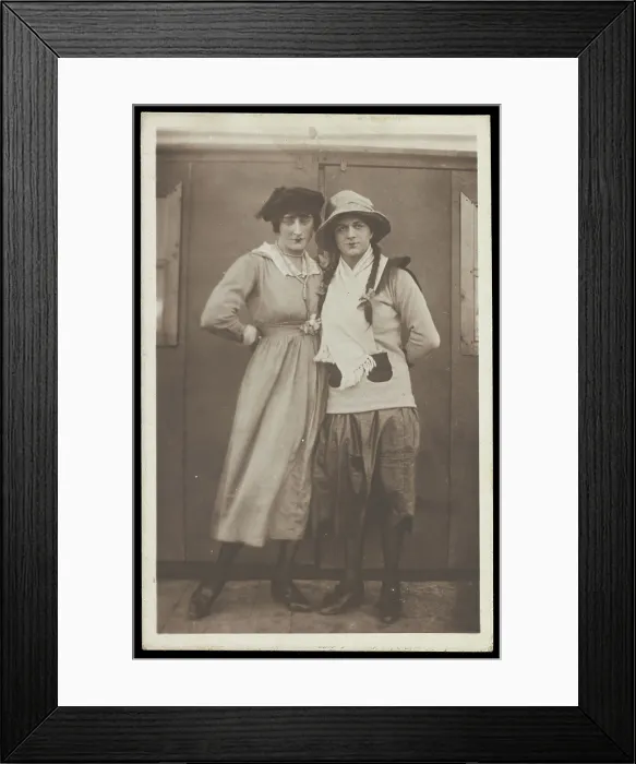 Framed Print : Two men, both in drag, pose wearing hats and make-up, c1918. Creator: Unknown Framed Print : Two men, both in drag, pose wearing hats and make-up, c1918. Creator: Unknown