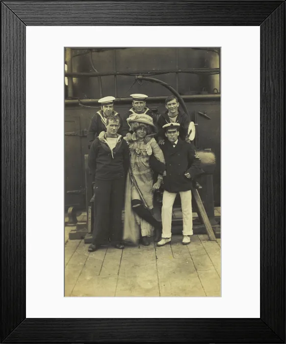 Framed Print : Six sailors, one in drag, pose for a group portrait on the deck of HMS St...(between 1910 and 1919?) Creator: Unknown Framed Print : Six sailors, one in drag, pose for a group portrait on the deck of HMS St...(between 1910 and 1919?) Creator: Unknown