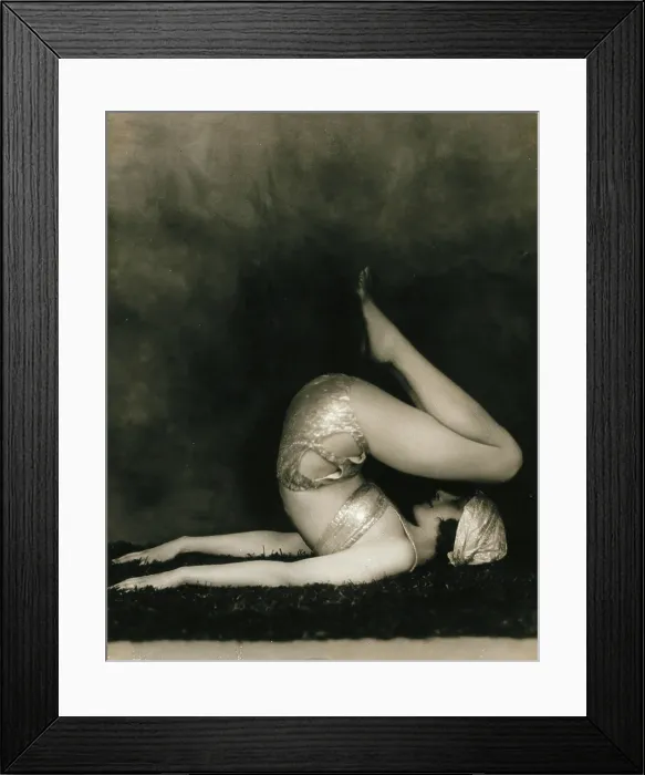 Framed Print : Marguerite Agniel posing with her back arched and feet in the air, wearing a two-piece cos... 1929. Creator: Unknown Framed Print : Marguerite Agniel posing with her back arched and feet in the air, wearing a two-piece cos... 1929. Creator: Unknown