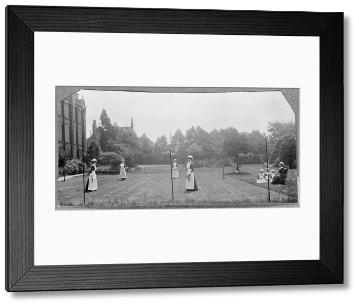 Framed Print : St Marylebone Infirmary, London: nurses playing tennis, 1906 (1912). Creator: Unknown Framed Print : St Marylebone Infirmary, London: nurses playing tennis, 1906 (1912). Creator: Unknown