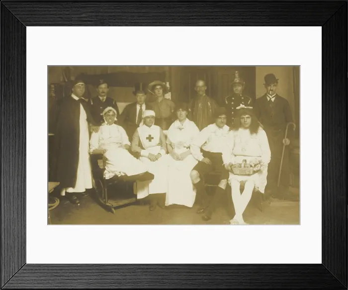 Framed Print : Amateur actors, some in drag, pose for a group portrait, (between 1910 and 1919?). Creator: Unknown Framed Print : Amateur actors, some in drag, pose for a group portrait, (between 1910 and 1919?). Creator: Unknown