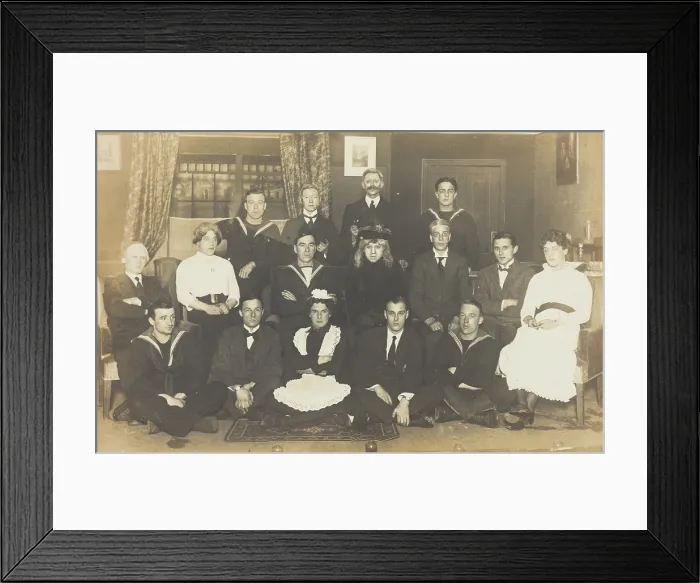Framed Print : Sailors, some in drag, posing for a group portrait within a highly...(between 1910 and 1919?). Creator: Unknown Framed Print : Sailors, some in drag, posing for a group portrait within a highly...(between 1910 and 1919?). Creator: Unknown