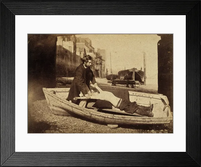 Framed Print : A man and a boy with bare torso in a rowing boat grounded on a beach... c1860s. Creator: Unknown Framed Print : A man and a boy with bare torso in a rowing boat grounded on a beach... c1860s. Creator: Unknown