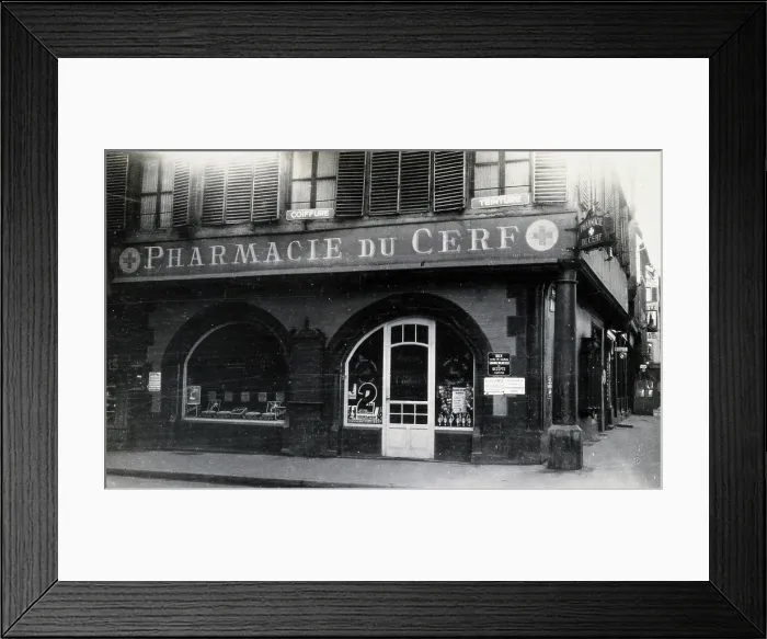 Framed Print : The front door of the Pharmacie du Cerf on the corner of the street, Strasbourg, c1900s.. Creator: Unknown Framed Print : The front door of the Pharmacie du Cerf on the corner of the street, Strasbourg, c1900s.. Creator: Unknown