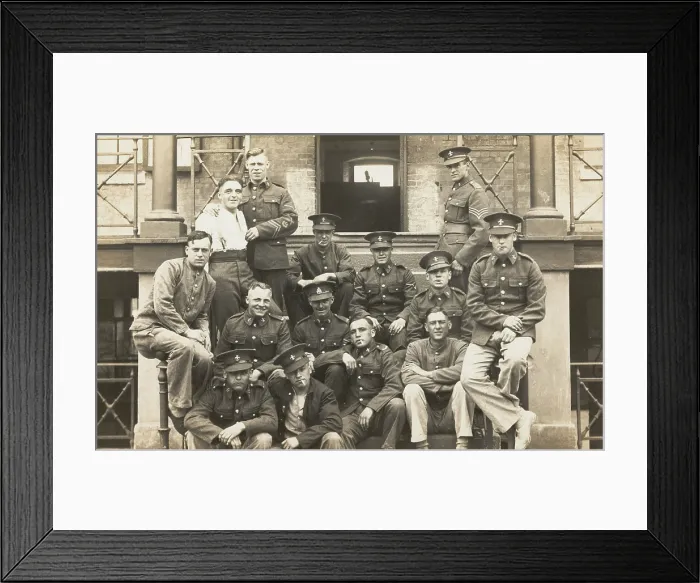Framed Print : Soldiers posing for a group portrait outside a large building, c1910s. Creator: Unknown Framed Print : Soldiers posing for a group portrait outside a large building, c1910s. Creator: Unknown