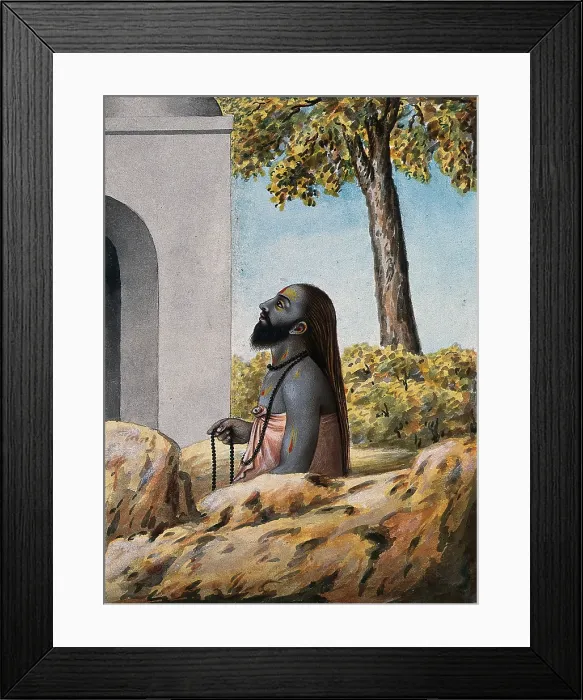 Framed Print : A Hindu ascetic or holy man, left profile view, meditating outside a temple (?), 1880. Creator: Unknown Framed Print : A Hindu ascetic or holy man, left profile view, meditating outside a temple (?), 1880. Creator: Unknown