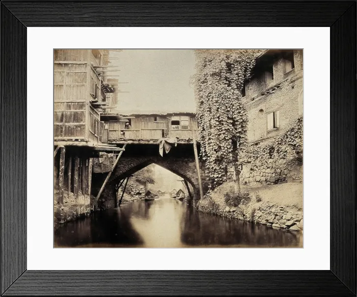 Framed Print : Kashmir: a built-over bridge on a canal betweeen houses, c1870s. Creator: Samuel Bourne Framed Print : Kashmir: a built-over bridge on a canal betweeen houses, c1870s. Creator: Samuel Bourne