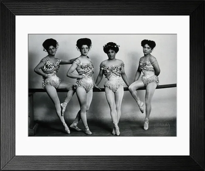 Framed Print : Four young woman acrobats (?), posing on a bar in a photographic studio, between 1899 and 1908. Creator: Unknown Framed Print : Four young woman acrobats (?), posing on a bar in a photographic studio, between 1899 and 1908. Creator: Unknown