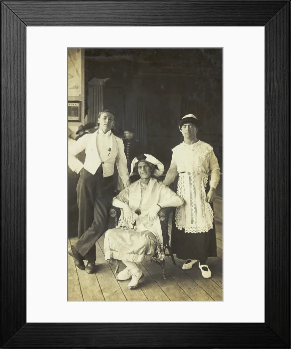 Framed Print : Three soldiers, two in drag, pose in costume, c1920. Creator: Unknown Framed Print : Three soldiers, two in drag, pose in costume, c1920. Creator: Unknown