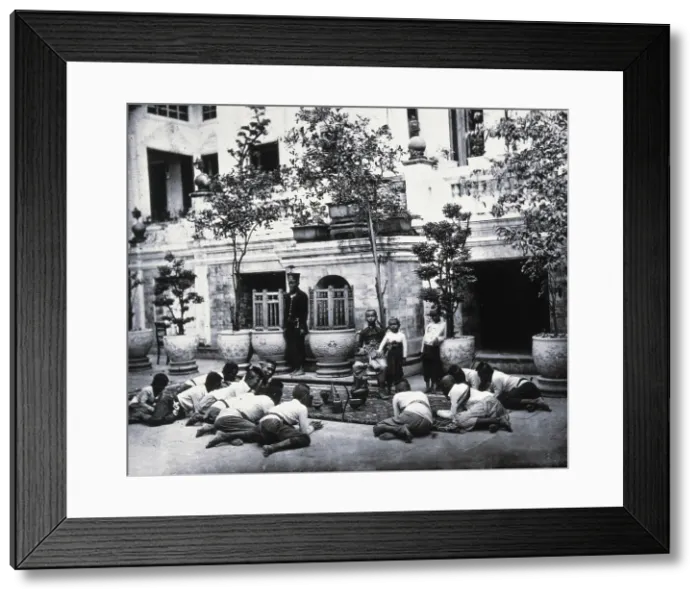 Framed Print : Prince Chulalongkorn of Siam (Thailand) (seated, centre), with Prince Bhanugrangsi... 1866. Creator: John Thomson Framed Print : Prince Chulalongkorn of Siam (Thailand) (seated, centre), with Prince Bhanugrangsi... 1866. Creator: John Thomson