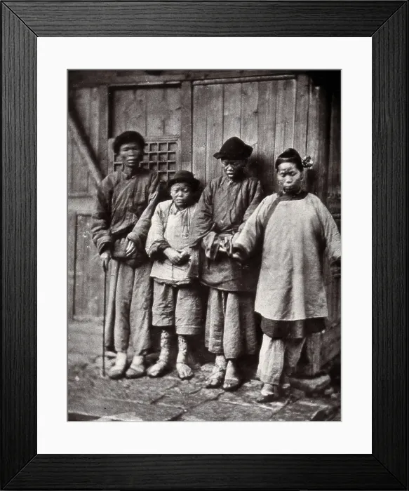 Framed Print : Foochow, China: four people with leprosy, wearing thick clothing, standing outside a wooden... 1873 Creator: John Thomson Framed Print : Foochow, China: four people with leprosy, wearing thick clothing, standing outside a wooden... 1873 Creator: John Thomson