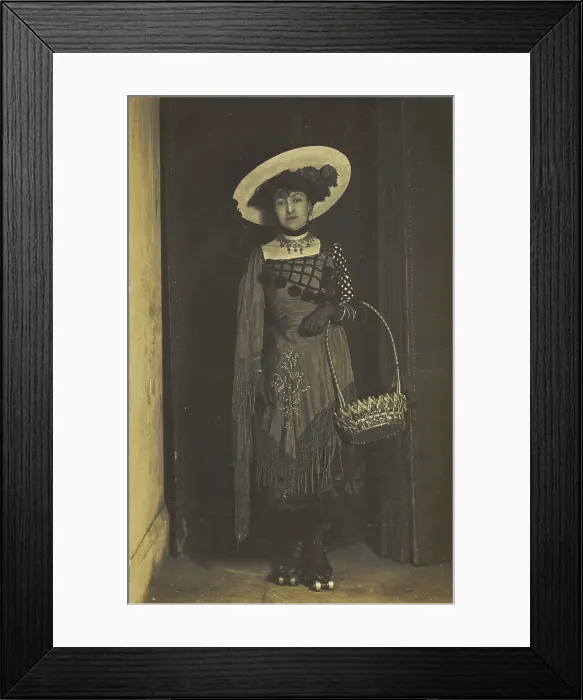 Framed Print : A person wearing a dress, large hat and roller skates, poses holding a basket, (1910-1919?). Creator: Unknown Framed Print : A person wearing a dress, large hat and roller skates, poses holding a basket, (1910-1919?). Creator: Unknown