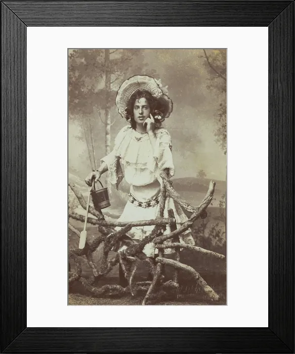 Framed Print : A sailor in drag posed behind a wooden fence, 1906. Creator: Unknown Framed Print : A sailor in drag posed behind a wooden fence, 1906. Creator: Unknown