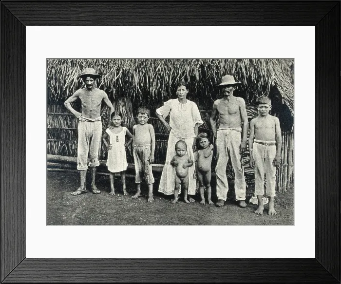 Framed Print : Panama Indian family outside a traditional hut, 1900 / 1910. Creator: Unknown Framed Print : Panama Indian family outside a traditional hut, 1900 / 1910. Creator: Unknown