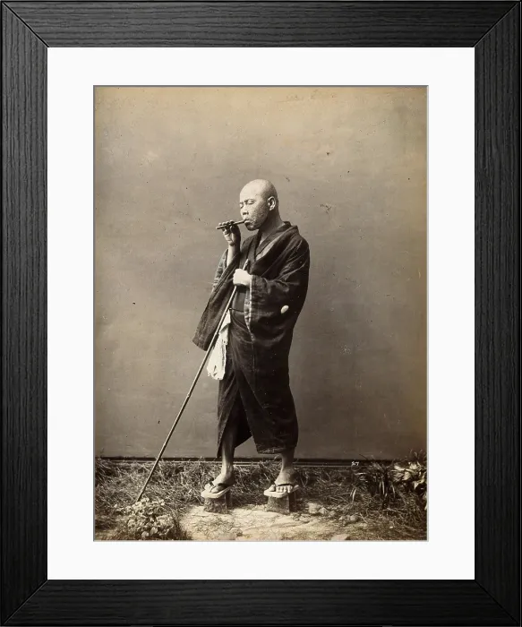 Framed Print : A blind Japanese masseur with a pipe in his mouth and a long pole in his hand, c1890s. Creator: Unknown Framed Print : A blind Japanese masseur with a pipe in his mouth and a long pole in his hand, c1890s. Creator: Unknown