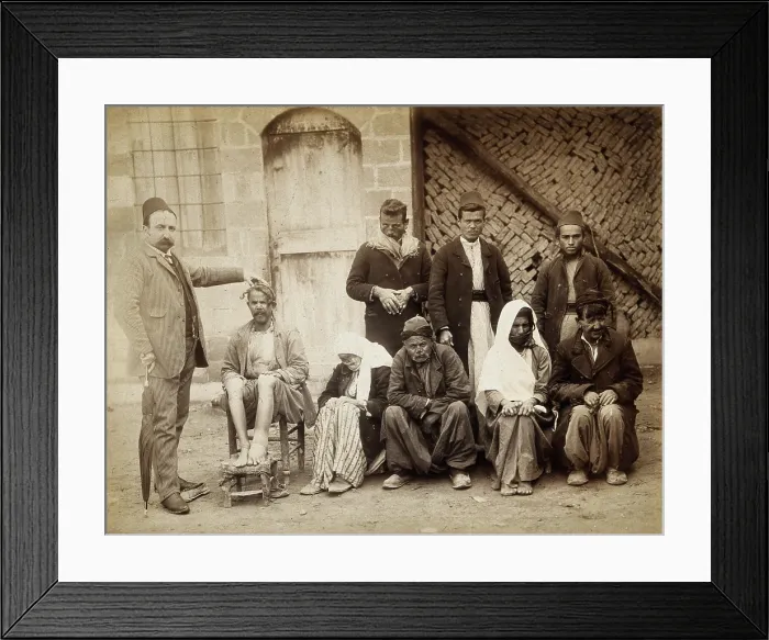 Framed Print : A group of people with leprosy in Jerusalem: a man in a striped suit... c1890s. Creator: Unknown Framed Print : A group of people with leprosy in Jerusalem: a man in a striped suit... c1890s. Creator: Unknown