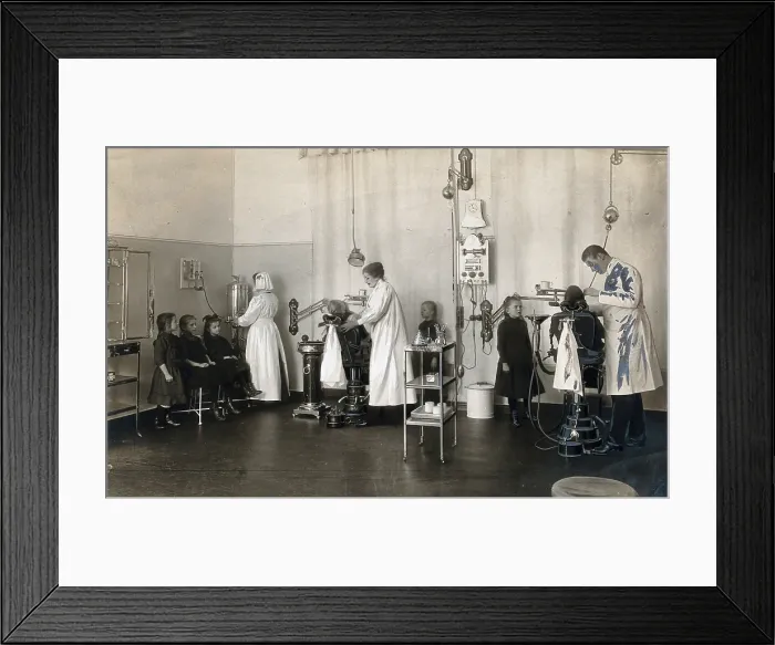 Framed Print : A school-children's dental clinic in Berlin: some children being treated... c1900