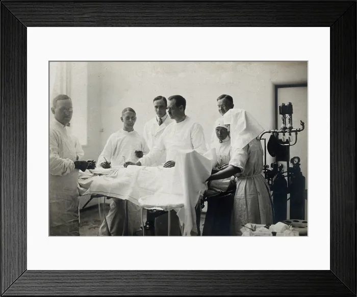 Framed Print : Einar Key (fourth from left), a Swedish surgeon, in an operating theatre... c1910. Creator: Unknown Framed Print : Einar Key (fourth from left), a Swedish surgeon, in an operating theatre... c1910. Creator: Unknown