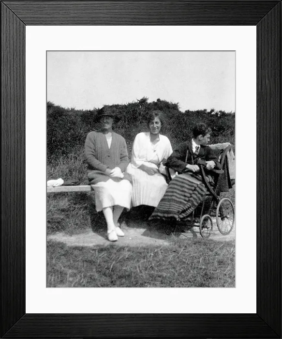 Framed Print : A physically disabled boy sitting in a wheelchair, c1910 / 1925. Creator: Unknown Framed Print : A physically disabled boy sitting in a wheelchair, c1910 / 1925. Creator: Unknown